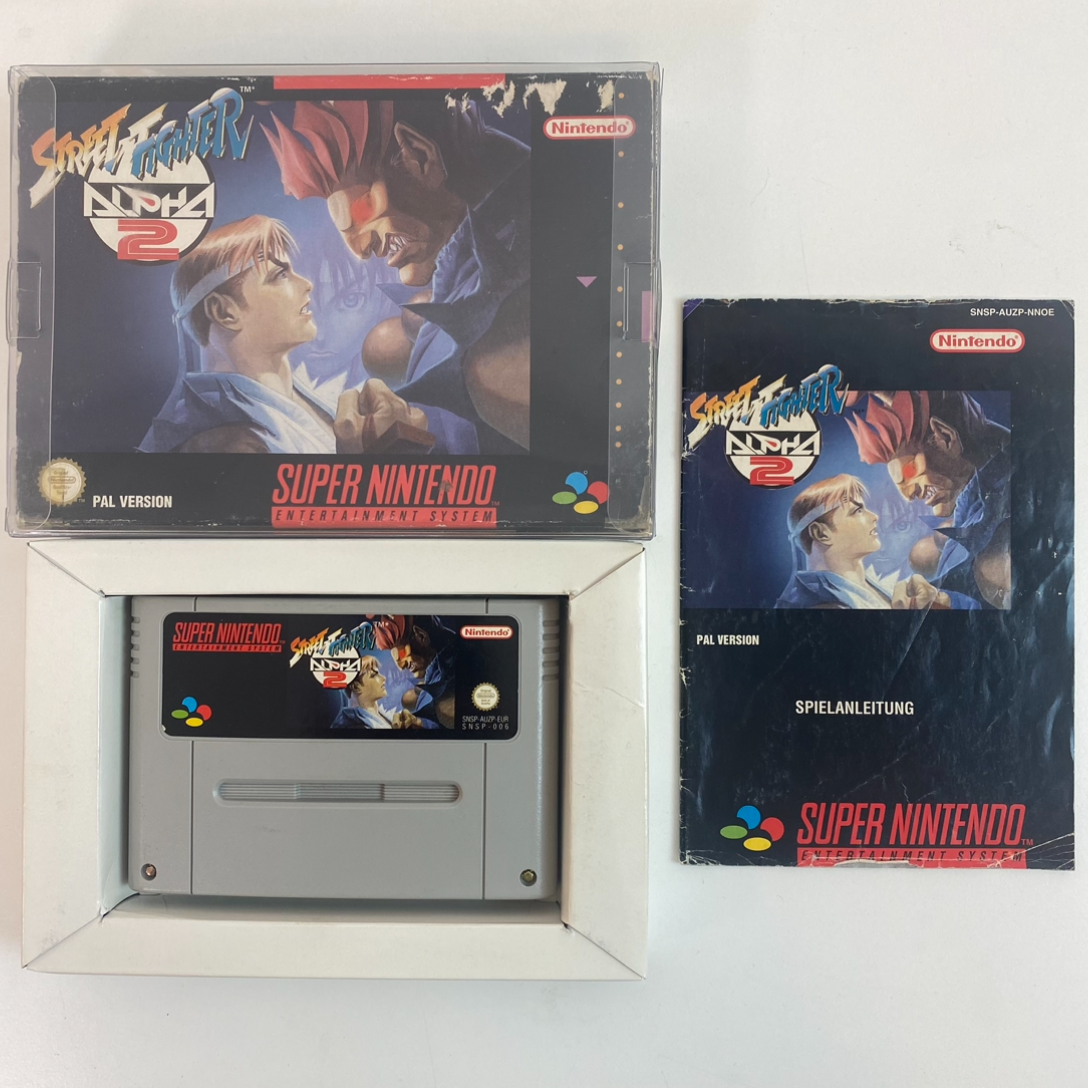 Street Fighter II Alpha - Super Nintendo (SNES) - Tested, with original packaging, manual and protective case